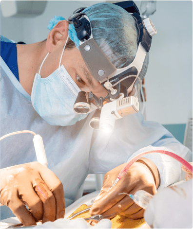 Specialist in surgery working on patient's eye